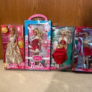 Barbie‘s lot of 4 Christmas Barbie’s